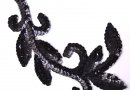 Motif floral paillettes noires