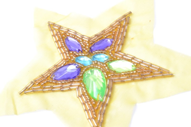 Star design, beads and spangles