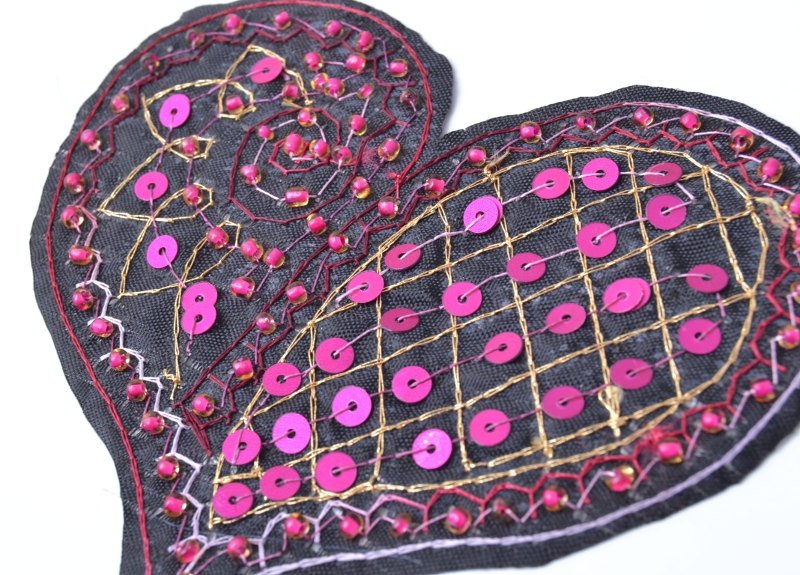 Black heart design, thread, beads and spangles