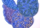 Blue flower design, thread and beads