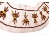 Embroidered neckline with beads