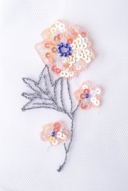 Flower design, beads and spangles on tulle